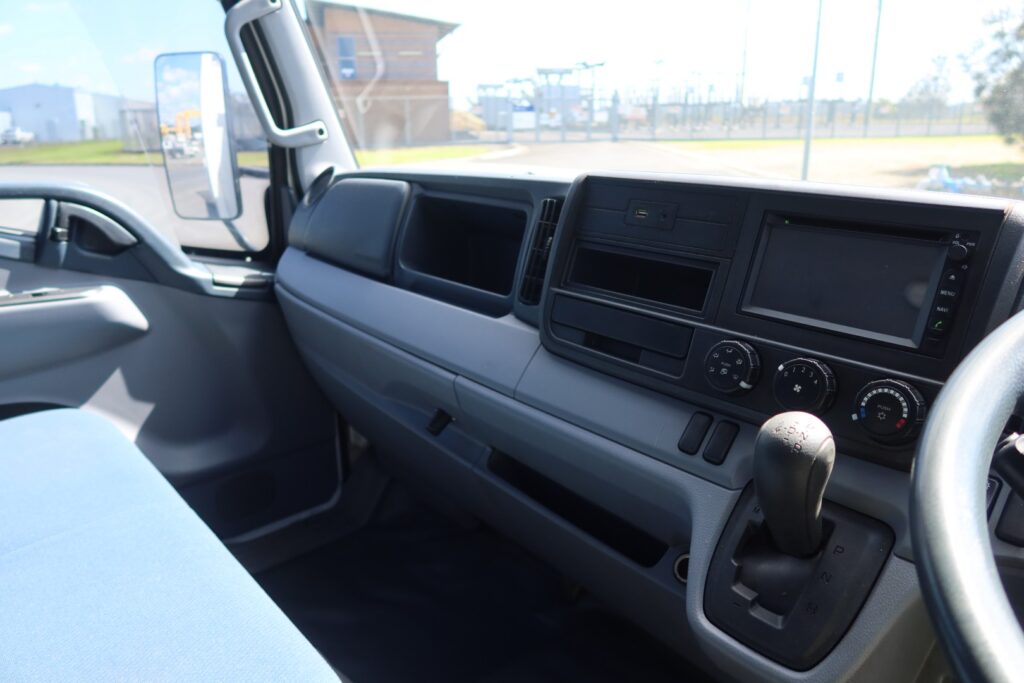 2015 Fuso Canter FE 515 AMT Auto SWB - BEAVERTAIL RAMP TRUCK image 16