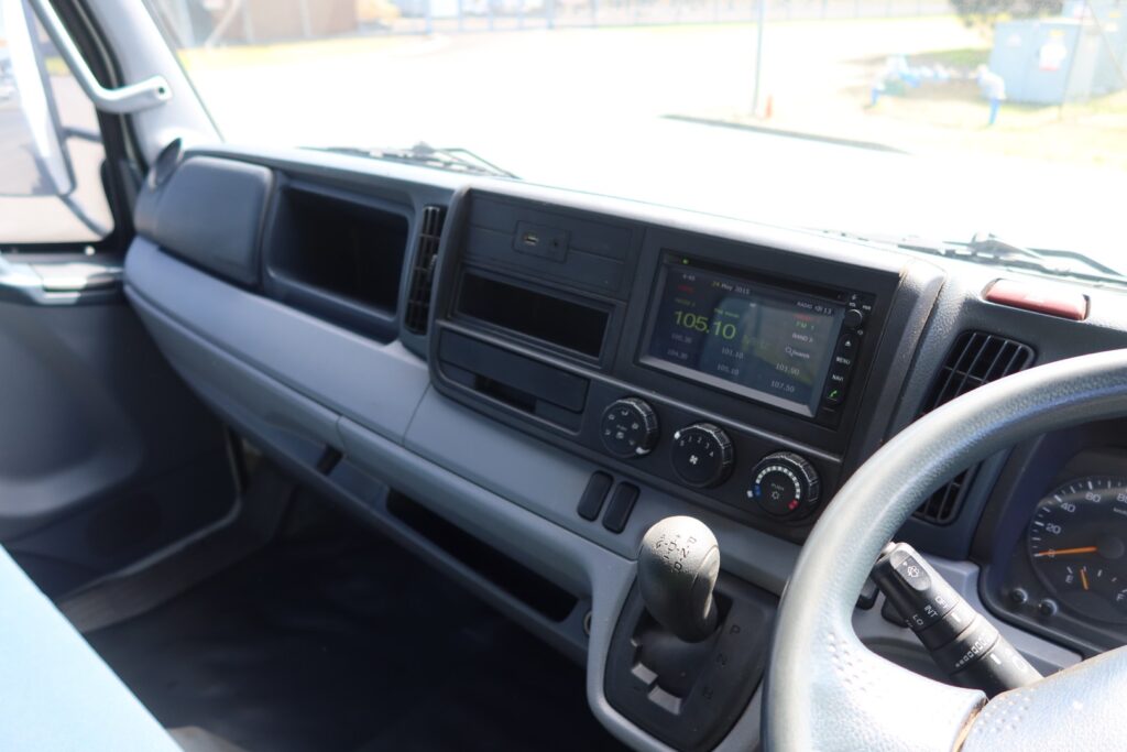 2015 Fuso Canter FE 515 AMT Auto SWB - BEAVERTAIL RAMP TRUCK image 17
